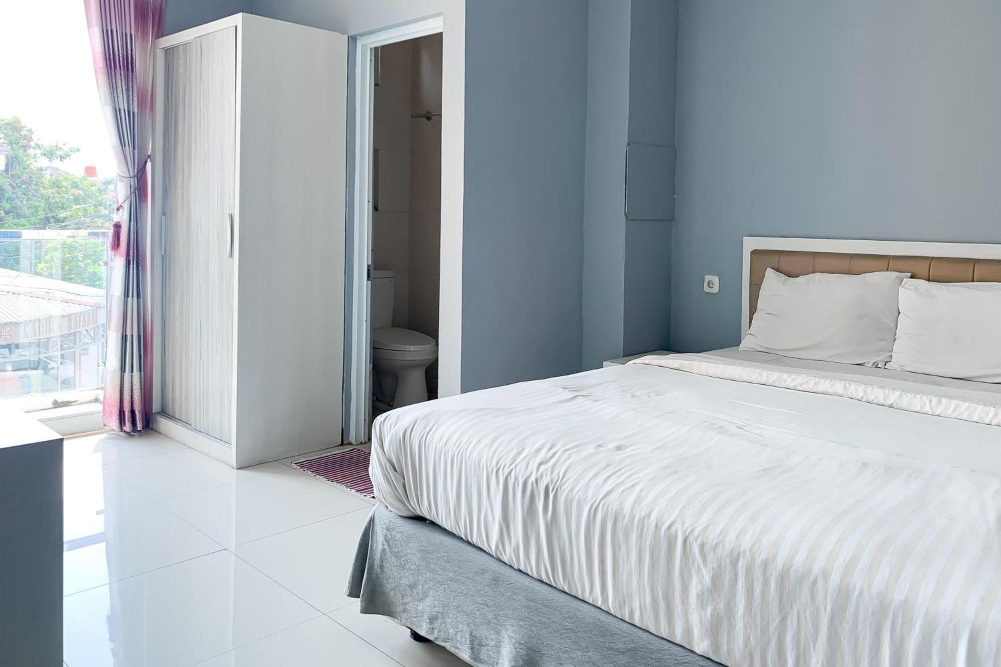 Karins Guesthouse Syariah Redpartner バンドゥン エクステリア 写真